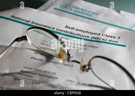 Self-Employed National Insurance Contributions (NICs) form used for declaring and paying Class 2 and Class 4 NICs in the UK Stock Photo