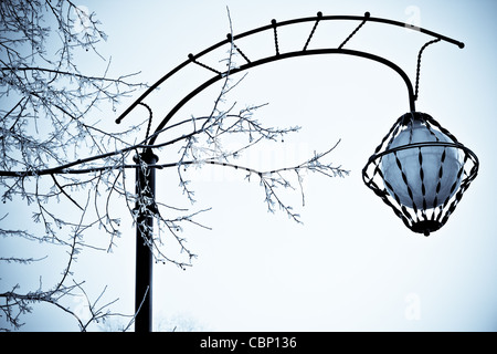 old style street lantern in the winter street Stock Photo
