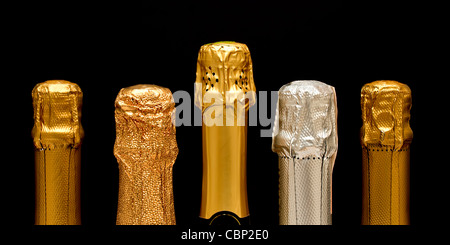 Various sparkling wine bottle necks Stock Photo