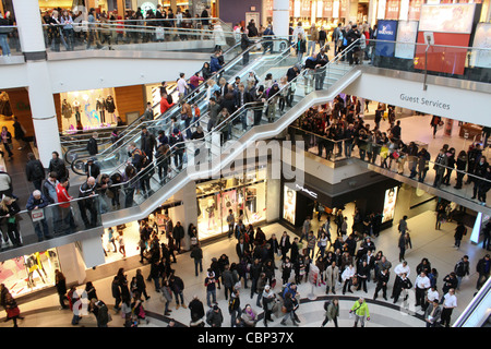 busy crowd inside shopping mall multi level Stock Photo