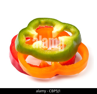 Orange green and red pepper slices on white background with shadow Stock Photo