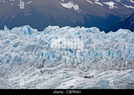 People trekking on Perito Moreno glacier. Los Glaciares National Park, El Calafate, Santa Cruz province. Patagonia. Argentina. Stock Photo