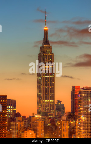 The Empire State Building during morning twilight as viewed looking east from New Jersey.