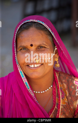 Indian woman with traditional nose jewel in old town Udaipur, Rajasthan ...