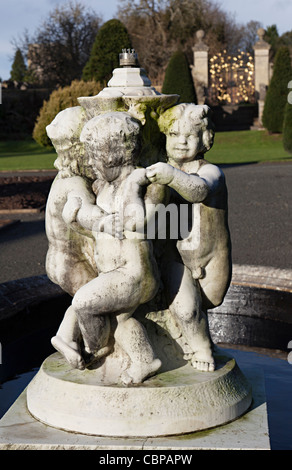 Cherubs on fountain in grounds of St Fagan's castle Cardiff Wales UK Stock Photo