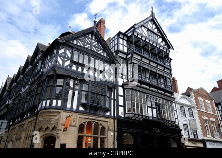 The unique building style of the Chester Rows at the corner of Eastgate and St. Werburgh street in Chester, Cheshire UK Stock Photo
