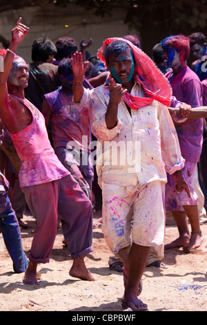 Indian people celebrate Hindu Holi festival of colours with powder paints in Mumbai, India Stock Photo