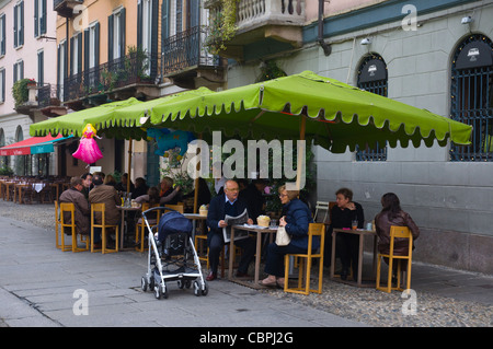 Cafe terrace along Corso di Porta Ticinese street Milan Lombardy region Italy Europe