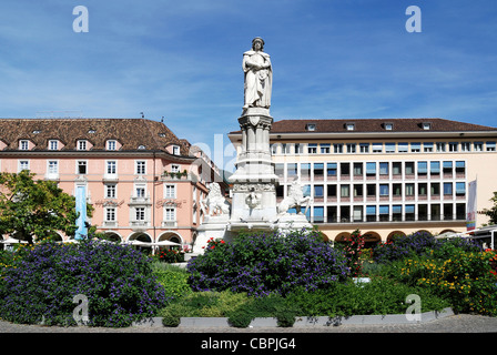 Waltherplatz of Bozen in South Tyrol with the monument to the poet Walther von der Vogelweide. Stock Photo