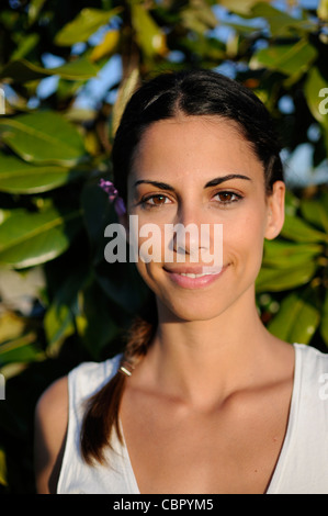 MR Portait of attractive young spanish woman in nature Stock Photo