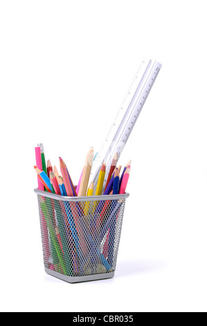 used pencils in metal cup, isolated on a white background Stock Photo
