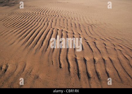 beach surface with ripples from small waves Stock Photo