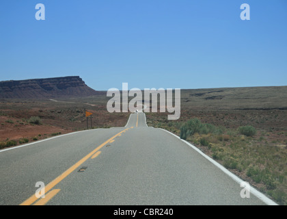 highway 89A in Northern Arizona cuts across the desert into heat haze Stock Photo