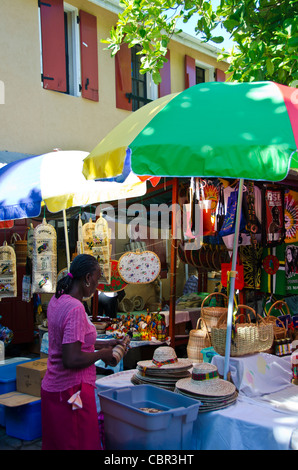 Woman selling souvenirs in Roseau Dominica in the Eastern Caribbean Stock Photo