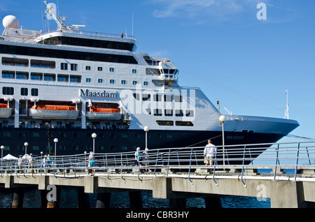 Holland America Maasdam at Roseau Dominica tourists on cruise ship pier Eastern Caribbean cruise port Stock Photo