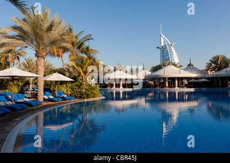 Swimming pool and restaurant pavilions in Al Qasr hotel at Jumeirah Madinat in Dubai in United Arab Emirates Stock Photo