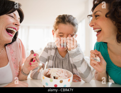 Family eating ice cream together Stock Photo
