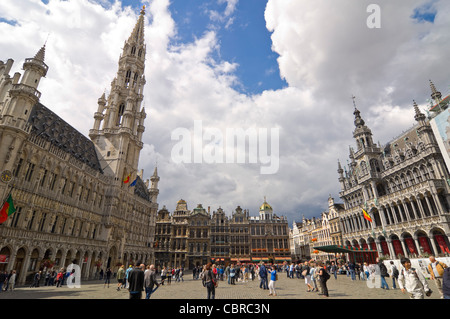 Horizontal wide angle view of the amazing Gothic architecture of Brussels Town Hall in the Grand Place on a sunny day. Stock Photo