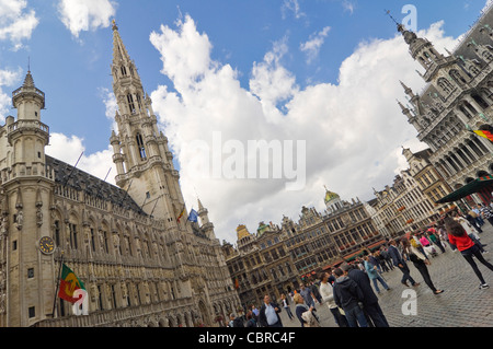 Horizontal wide angle of the amazing Gothic architecture of Brussels Town Hall or Stadhuis in the Grand Place on a sunny day. Stock Photo