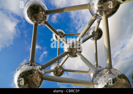 Horizontal close up of the nine reflective spheres of the Atomium monument in Heysel Park against a blue sky. Stock Photo