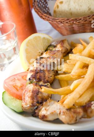 [Edit]  food, souvlaki, pork, skewer, tzatziki, garlic, sour, cream, salad, Greek, Greece, taverna, restaurant, typical, travel Stock Photo