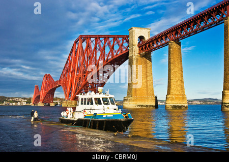 Newly painted Forth Rail Bridge seen from South Queensferry in Scotland Stock Photo