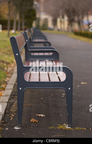 set of new benches located in central park of Brasov City Stock Photo