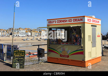 Kelly's Cornish ice cream parlour selling ice creams on the seafront promenade in St Ives, Cornwall, England, UK, Britain. Stock Photo