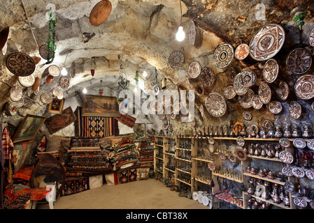 Underground antique shop in Derinkuyu, very close to the entrance of the underground city. Cappadocia, Turkey Stock Photo