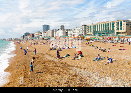 Nudist swimmers on Brighton beach Stock Photo - Alamy
