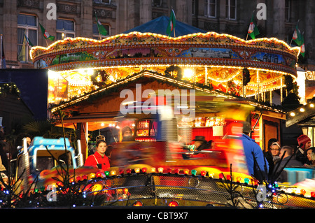 Children's ride at Frankfurt Christmas Market, Victoria Square, Birmingham, West Midlands, England, United Kingdom Stock Photo