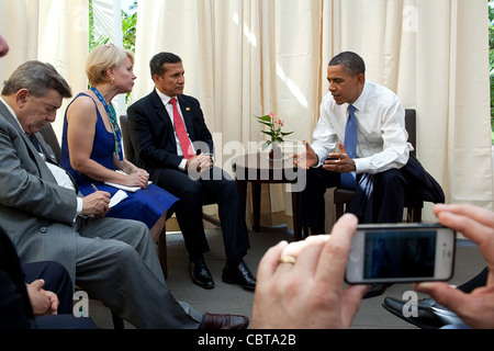 President Barack Obama meets with President Ollanta Humala of Peru during the APEC summit November 12, 2011 in Honolulu, Hawaii. Stock Photo