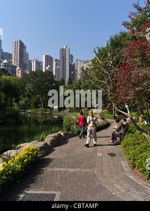 dh Hong Kong Park CENTRAL HONG KONG People in park lake and Mid levels skyscrapers gardens tourist china garden Stock Photo