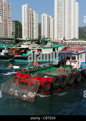 dh Aberdeen Harbour cleaning ABERDEEN HONG KONG Boat dredging anchorage collecting water rubbish environment clean up Stock Photo