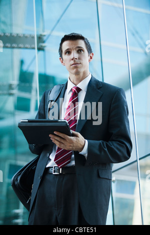 Caucasian businessman using digital tablet Stock Photo