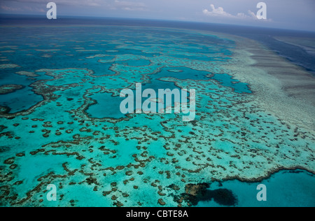 Aerial views of beautiful Heart Reef in the spectacular Great Barrier Reef near the Whitsunday Islands in Queensland, Australia. Stock Photo