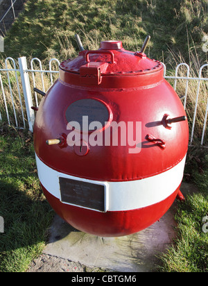 A 1940 WW2 naval  mine converted for use as a collecting box for charity the Shipwrecked Mariners Society, Sunderland, UK Stock Photo