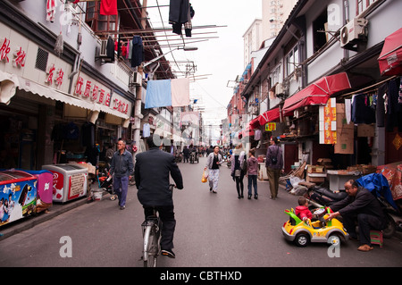 Chinese people in a street of Shanghai old town (Nanshi district)  - China Stock Photo