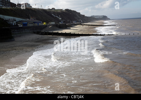 Waves break on beach, Cromer, Norfolk, England Stock Photo