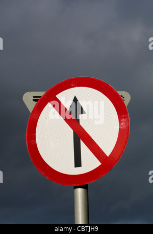 No Entry traffic sign against stormy sky, Clonakilty, County Cork, Republic of Ireland. Stock Photo