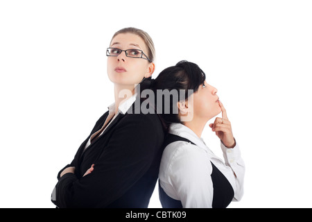 Two young business women competition concept, isolated on white background. Stock Photo