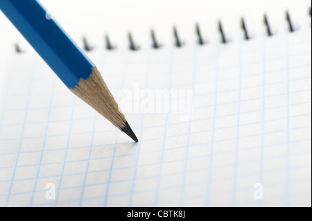 Notebook and pencil. Photo closeup. Selective focus Stock Photo