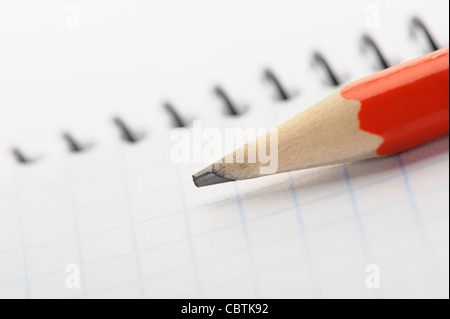 Notebook and pencil. Photo closeup. Selective focus Stock Photo