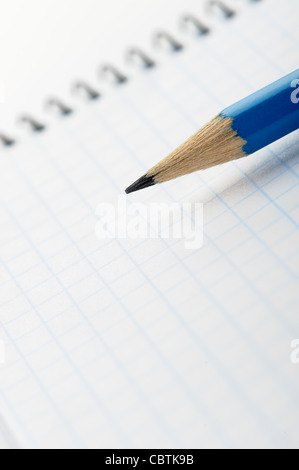 Notebook and pencil. Photo closeup. Selective focus Stock Photo