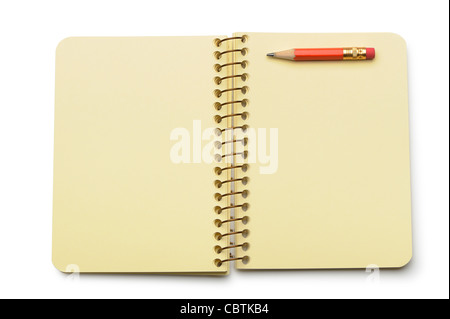 Notebook yellow paper and red pencil. Isolated on white Stock Photo