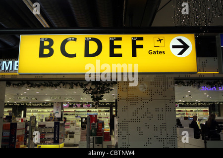 AIRPORT DIRECTION SIGN SCHIPHOL AIRPORT AMSTERDAM HOLLAND 24 November 2011 Stock Photo