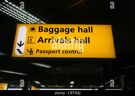 AIRPORT DIRECTION SIGN SCHIPHOL AIRPORT AMSTERDAM HOLLAND 24 November 2011 Stock Photo