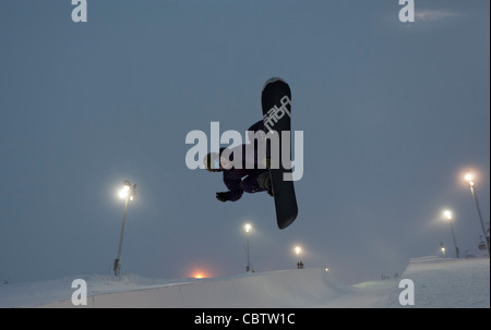 Snowboarder making tricks in the superpipe of Ruka, Kuusamo, Finland Stock Photo