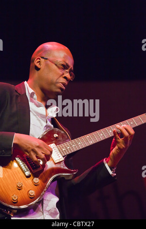 LIONEL LOUEKE plays guitar for HERBIE HANCOCK on the Jimmy Lyons Stage - 54TH MONTEREY JAZZ FESTIVAL 2011 Stock Photo