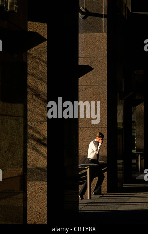 Business man walking into an office building Bellevue Washington Stock Photo